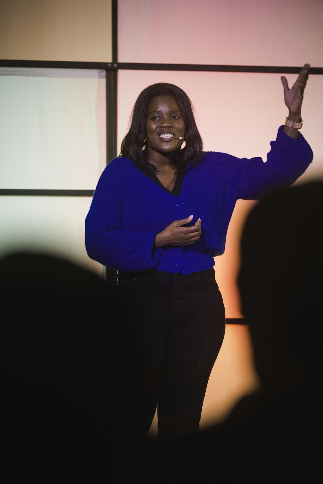 person giving speech on stage